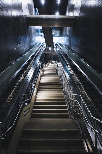 Tunnel escalator black and white
